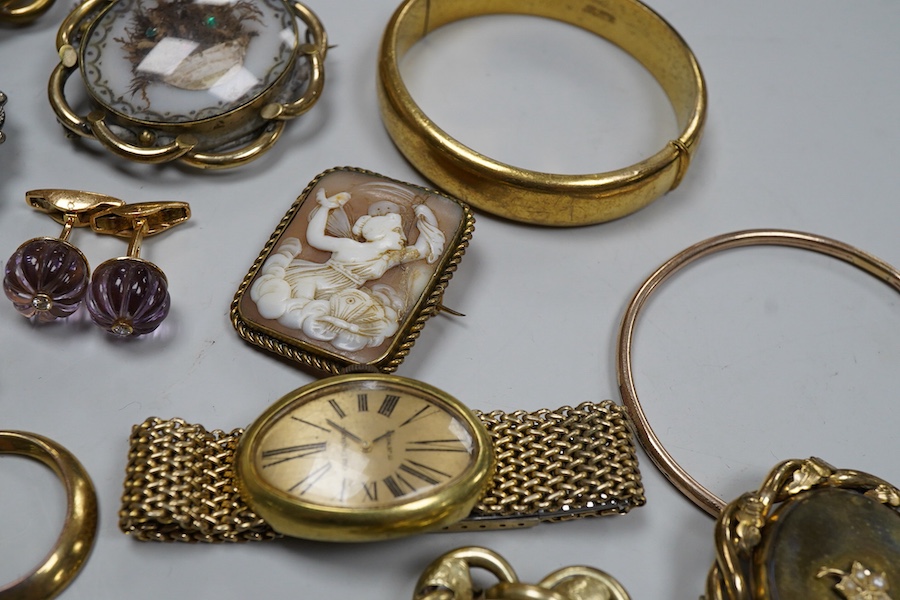 A pair of amethyst and diamond cufflinks and a collection of jewels, comprising: a pair of cufflinks, each set with a carved amethyst bead, accented with a brilliant-cut diamond, mounted in gold, each bead 13mm diameter;